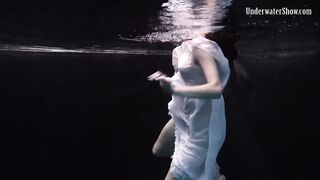 Dark pool vibes with white dress girl