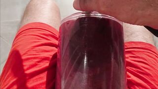 Giant balls pumping hunk outdoors