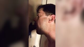 Amateur sucks big black cock at glory hole